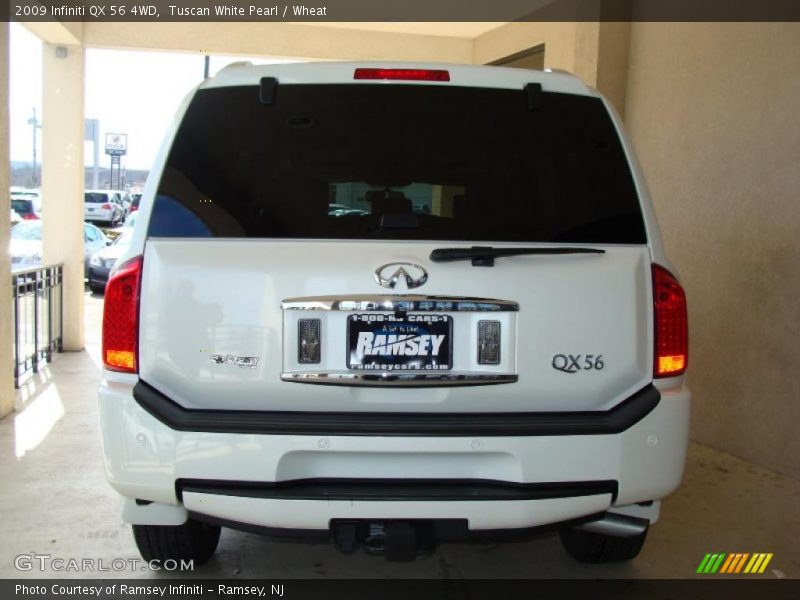 Tuscan White Pearl / Wheat 2009 Infiniti QX 56 4WD