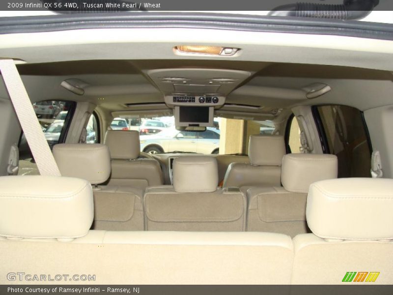 Tuscan White Pearl / Wheat 2009 Infiniti QX 56 4WD