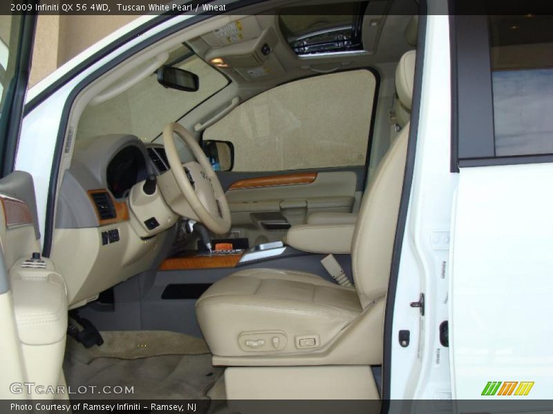 Tuscan White Pearl / Wheat 2009 Infiniti QX 56 4WD