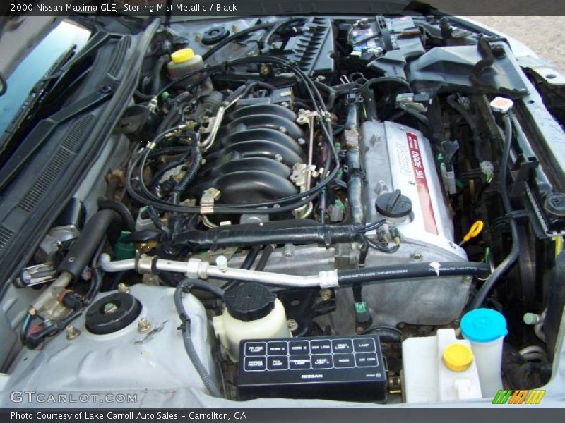 Sterling Mist Metallic / Black 2000 Nissan Maxima GLE