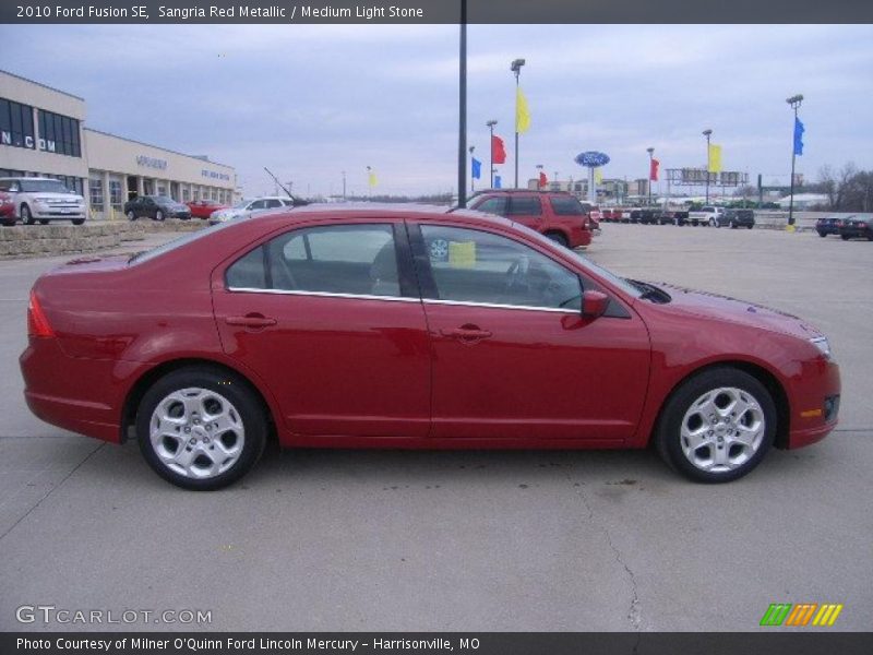 Sangria Red Metallic / Medium Light Stone 2010 Ford Fusion SE