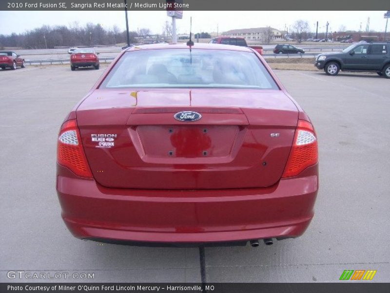 Sangria Red Metallic / Medium Light Stone 2010 Ford Fusion SE