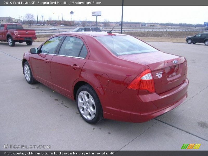 Sangria Red Metallic / Medium Light Stone 2010 Ford Fusion SE