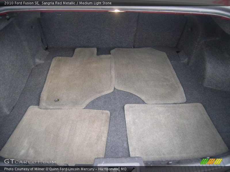 Sangria Red Metallic / Medium Light Stone 2010 Ford Fusion SE