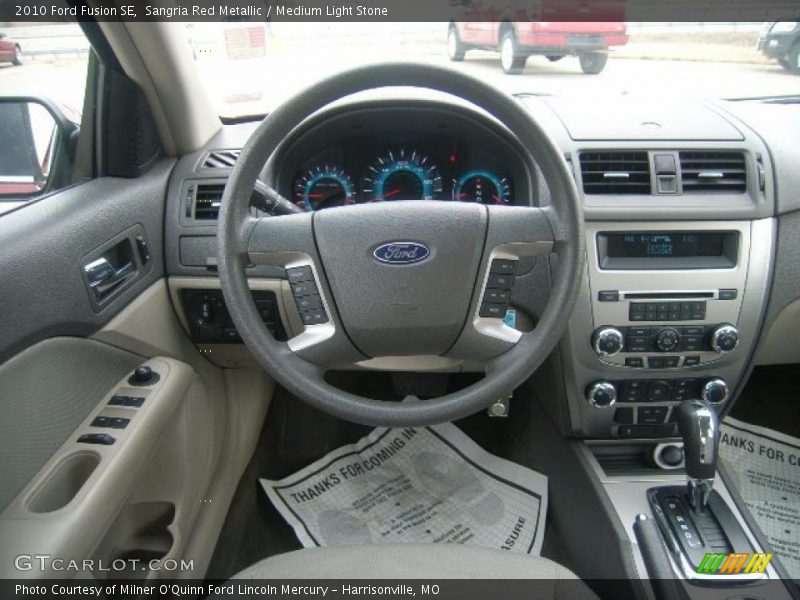 Sangria Red Metallic / Medium Light Stone 2010 Ford Fusion SE