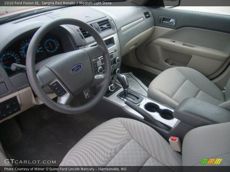Sangria Red Metallic / Medium Light Stone 2010 Ford Fusion SE
