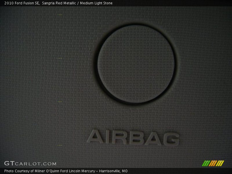 Sangria Red Metallic / Medium Light Stone 2010 Ford Fusion SE