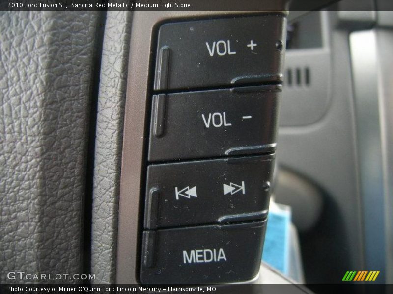 Sangria Red Metallic / Medium Light Stone 2010 Ford Fusion SE