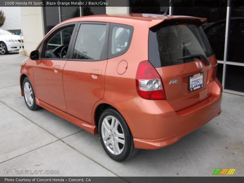 Blaze Orange Metallic / Black/Grey 2008 Honda Fit Sport