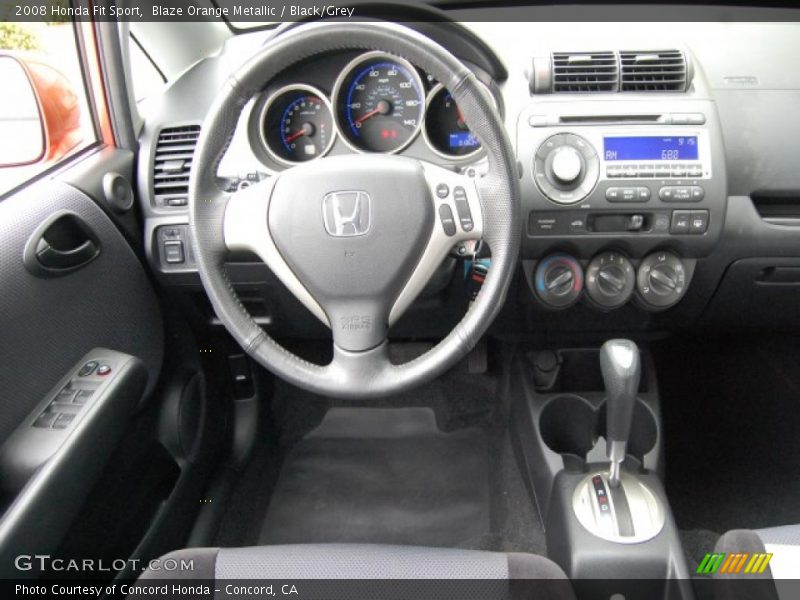 Blaze Orange Metallic / Black/Grey 2008 Honda Fit Sport