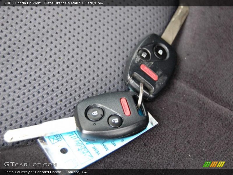 Blaze Orange Metallic / Black/Grey 2008 Honda Fit Sport