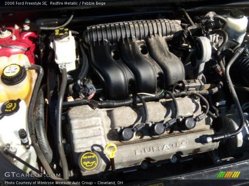 Redfire Metallic / Pebble Beige 2006 Ford Freestyle SE