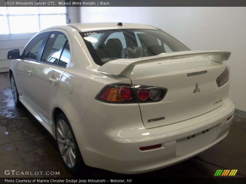 Wicked White Metallic / Black 2010 Mitsubishi Lancer GTS