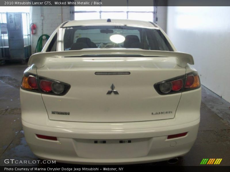 Wicked White Metallic / Black 2010 Mitsubishi Lancer GTS