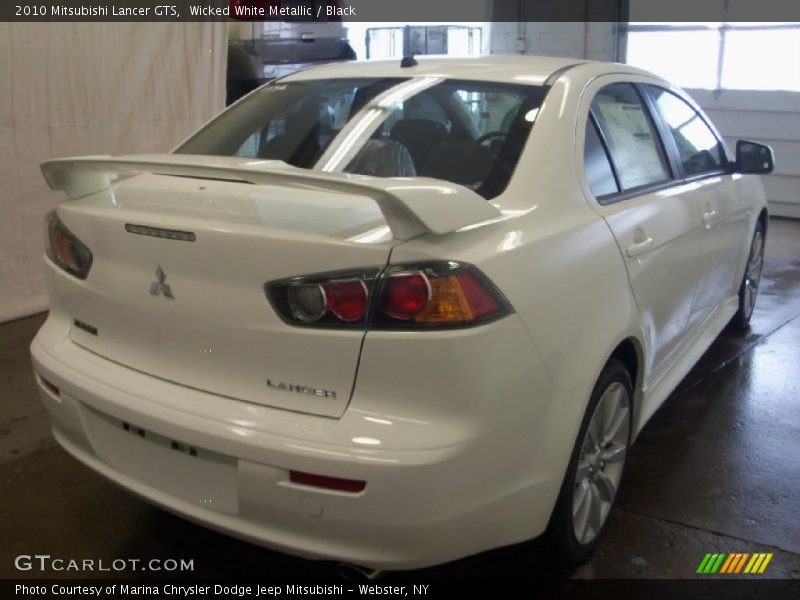 Wicked White Metallic / Black 2010 Mitsubishi Lancer GTS