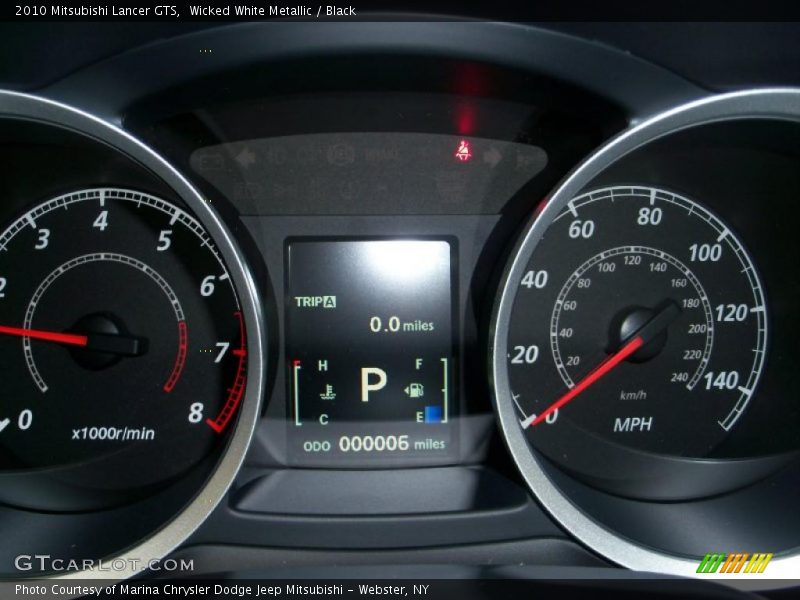 Wicked White Metallic / Black 2010 Mitsubishi Lancer GTS