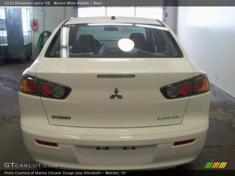 Wicked White Metallic / Black 2010 Mitsubishi Lancer DE