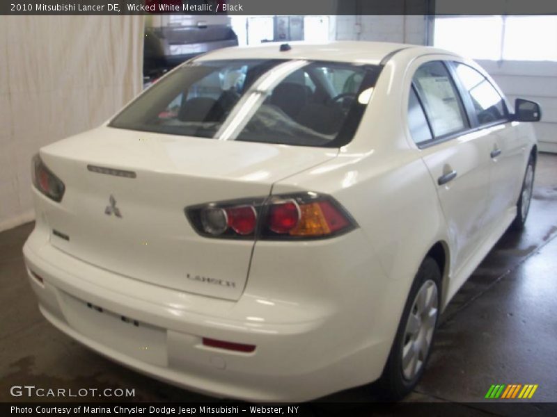 Wicked White Metallic / Black 2010 Mitsubishi Lancer DE