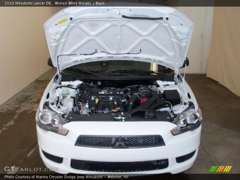 Wicked White Metallic / Black 2010 Mitsubishi Lancer DE
