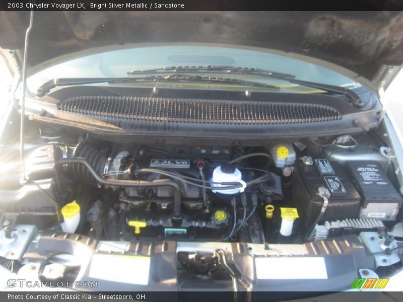 Bright Silver Metallic / Sandstone 2003 Chrysler Voyager LX