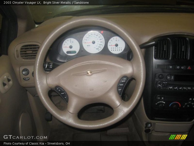 Bright Silver Metallic / Sandstone 2003 Chrysler Voyager LX