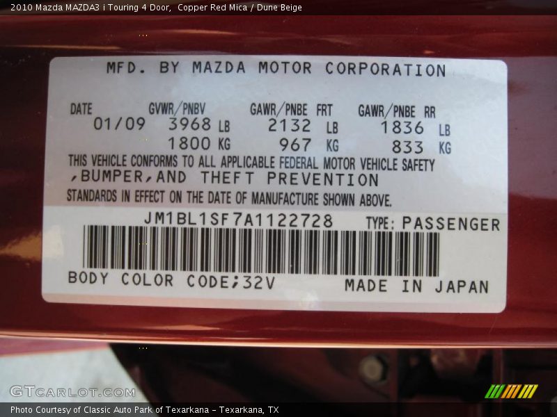 Copper Red Mica / Dune Beige 2010 Mazda MAZDA3 i Touring 4 Door