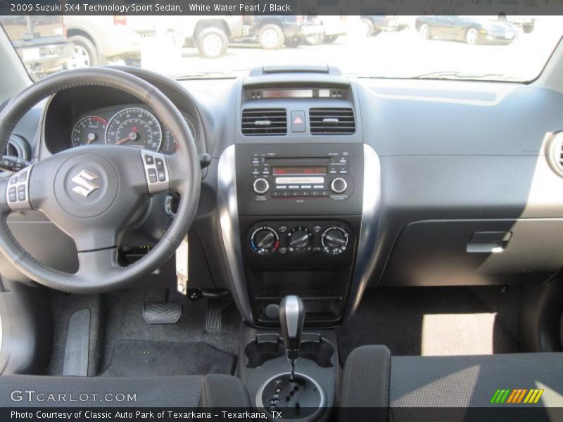 White Water Pearl / Black 2009 Suzuki SX4 Technology Sport Sedan