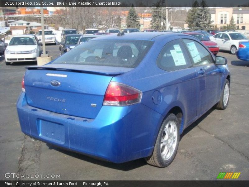 Blue Flame Metallic / Charcoal Black 2010 Ford Focus SE Coupe