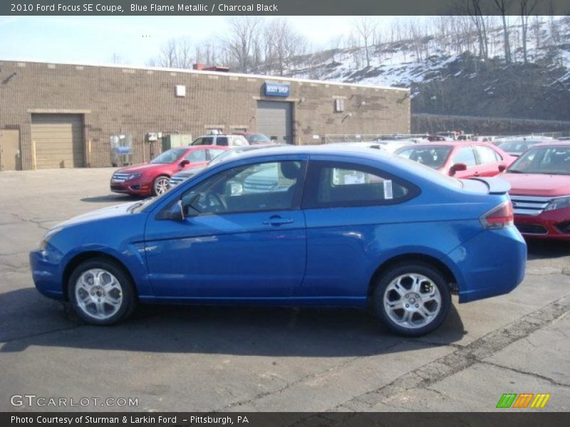 Blue Flame Metallic / Charcoal Black 2010 Ford Focus SE Coupe