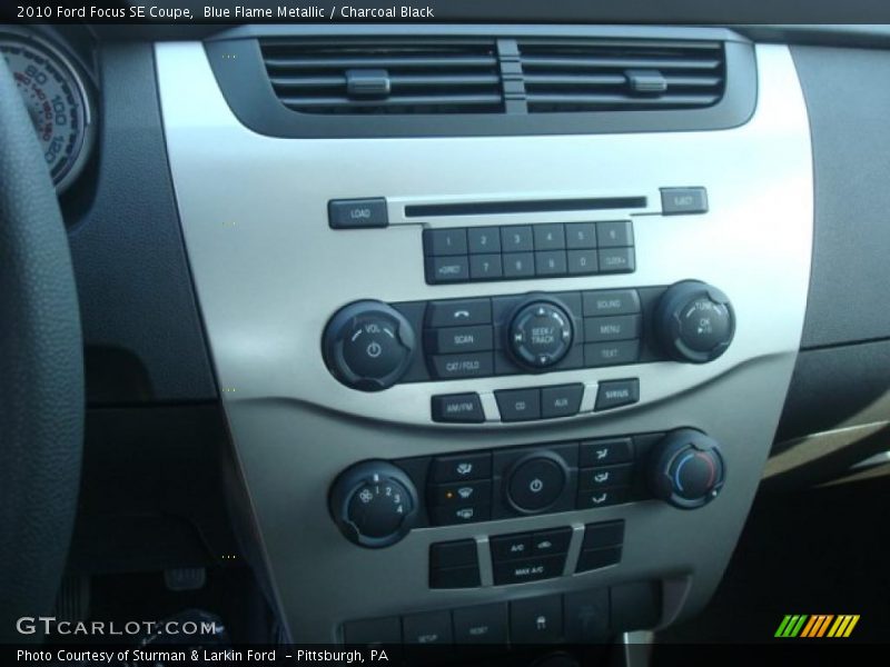 Blue Flame Metallic / Charcoal Black 2010 Ford Focus SE Coupe