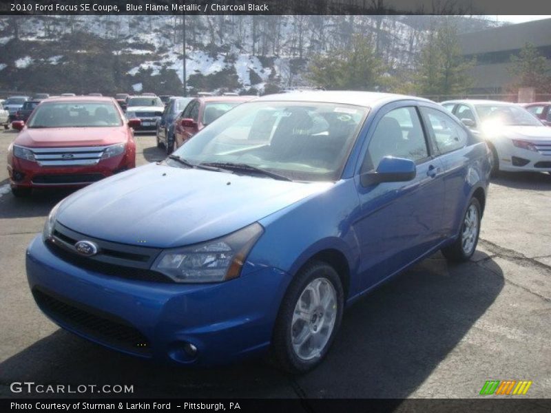 Blue Flame Metallic / Charcoal Black 2010 Ford Focus SE Coupe