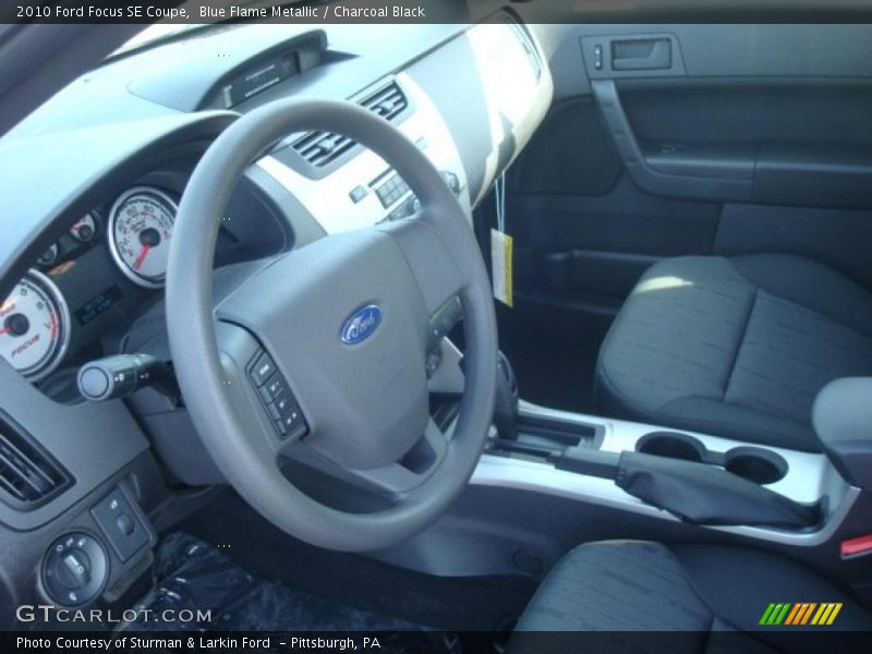 Blue Flame Metallic / Charcoal Black 2010 Ford Focus SE Coupe
