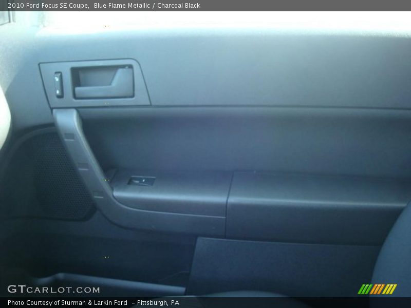 Blue Flame Metallic / Charcoal Black 2010 Ford Focus SE Coupe