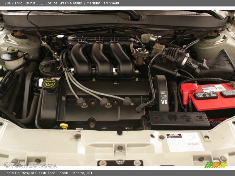 Spruce Green Metallic / Medium Parchment 2002 Ford Taurus SEL