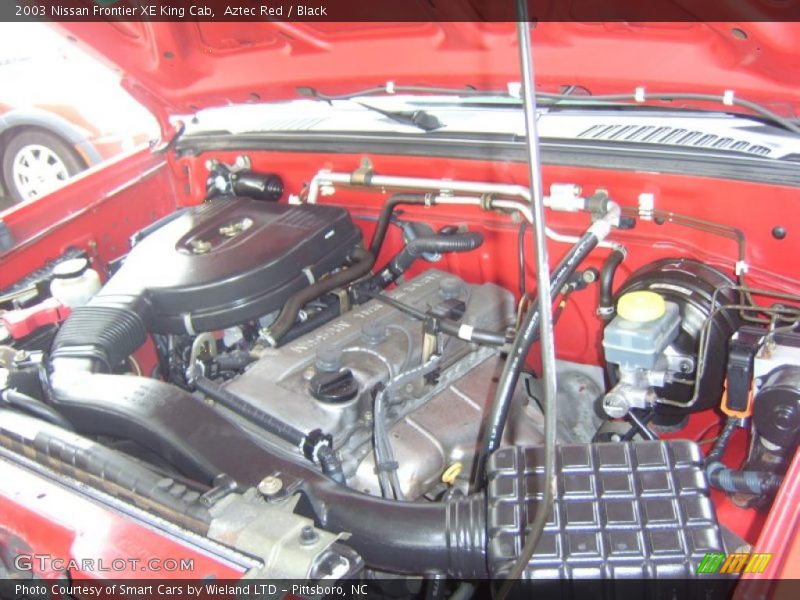 Aztec Red / Black 2003 Nissan Frontier XE King Cab