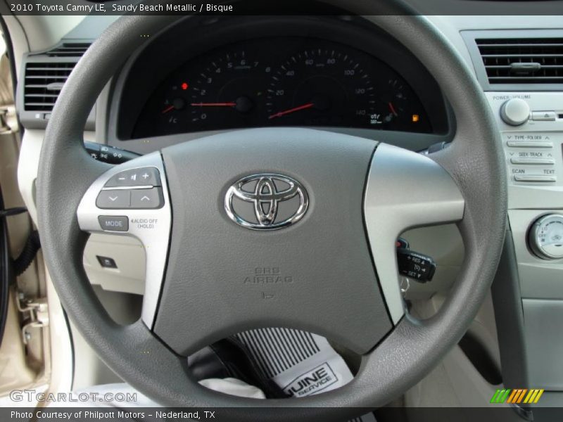 Sandy Beach Metallic / Bisque 2010 Toyota Camry LE