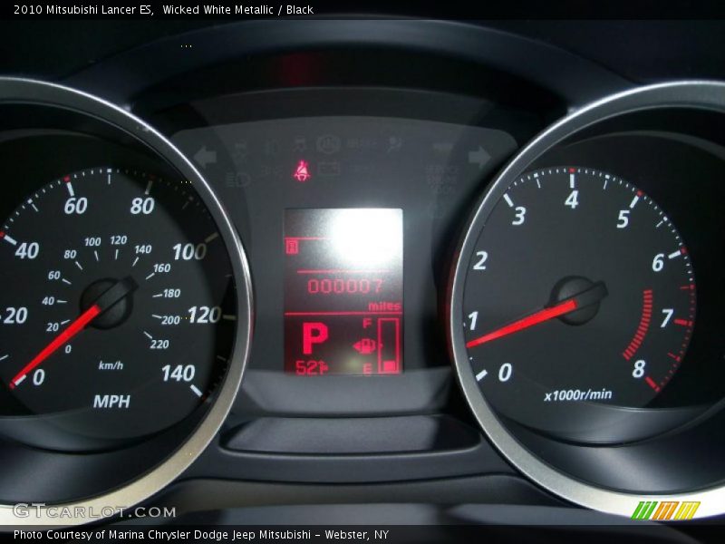 Wicked White Metallic / Black 2010 Mitsubishi Lancer ES