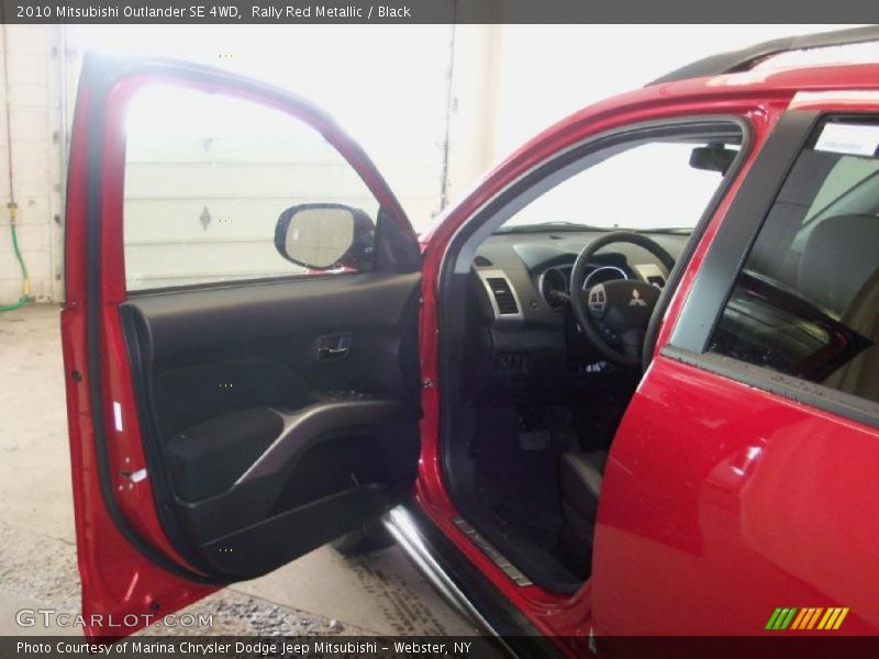 Rally Red Metallic / Black 2010 Mitsubishi Outlander SE 4WD