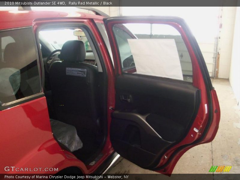 Rally Red Metallic / Black 2010 Mitsubishi Outlander SE 4WD