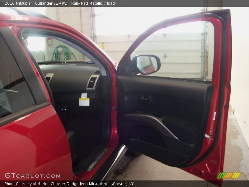 Rally Red Metallic / Black 2010 Mitsubishi Outlander SE 4WD