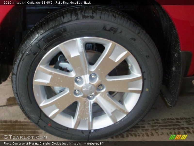 Rally Red Metallic / Black 2010 Mitsubishi Outlander SE 4WD