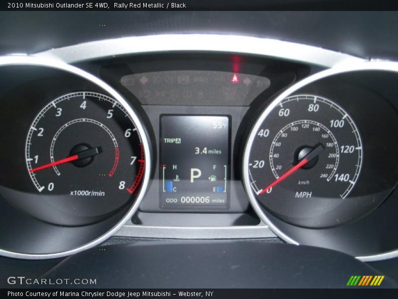 Rally Red Metallic / Black 2010 Mitsubishi Outlander SE 4WD