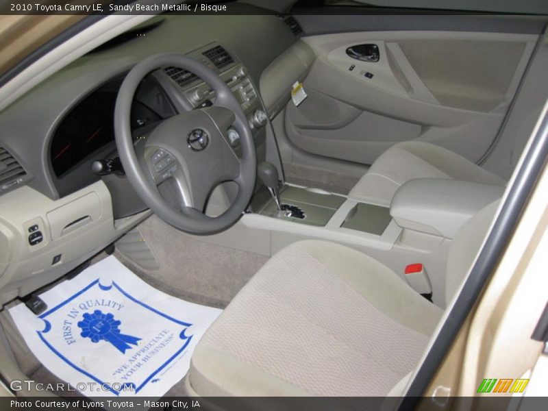 Sandy Beach Metallic / Bisque 2010 Toyota Camry LE