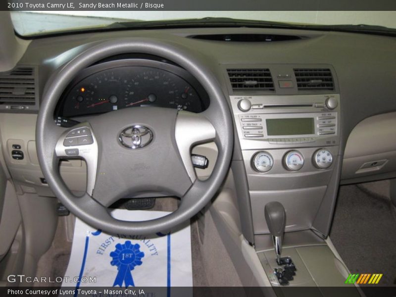 Sandy Beach Metallic / Bisque 2010 Toyota Camry LE