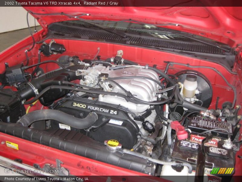 Radiant Red / Gray 2002 Toyota Tacoma V6 TRD Xtracab 4x4
