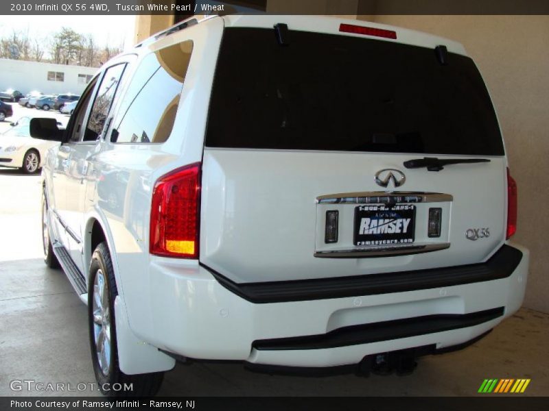 Tuscan White Pearl / Wheat 2010 Infiniti QX 56 4WD