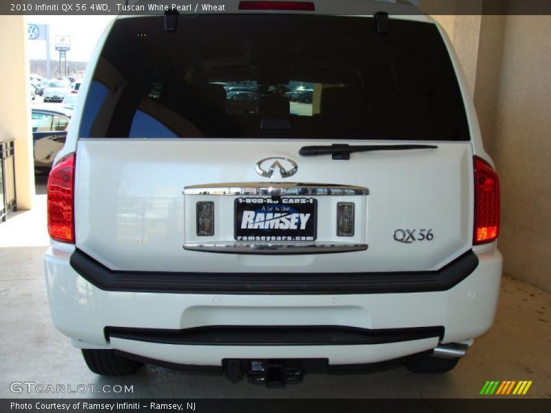 Tuscan White Pearl / Wheat 2010 Infiniti QX 56 4WD