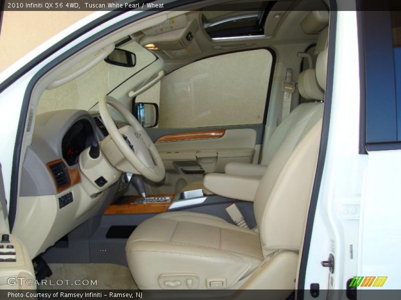 Tuscan White Pearl / Wheat 2010 Infiniti QX 56 4WD