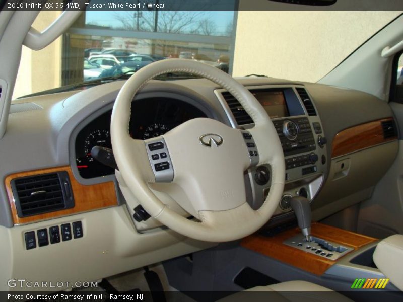 Tuscan White Pearl / Wheat 2010 Infiniti QX 56 4WD