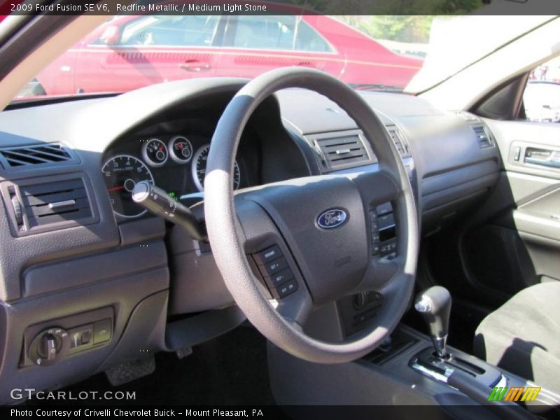 Redfire Metallic / Medium Light Stone 2009 Ford Fusion SE V6